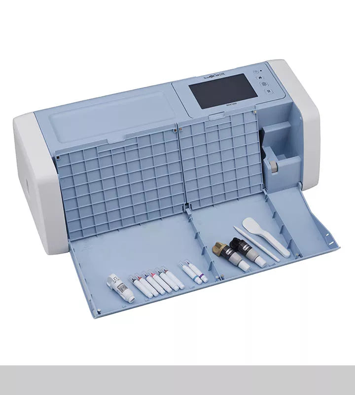 Brother ScanNCut SDX1200 in use cutting patterned material